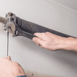 Broken Garage Door Spring: What to Do and Why Not to DIY